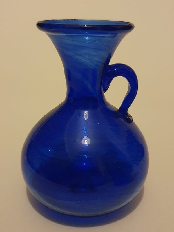 Round bodied, flared necked blue glass vase