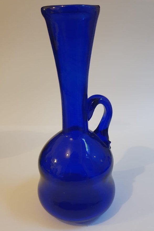 Rounded two section body, long necked blue vase